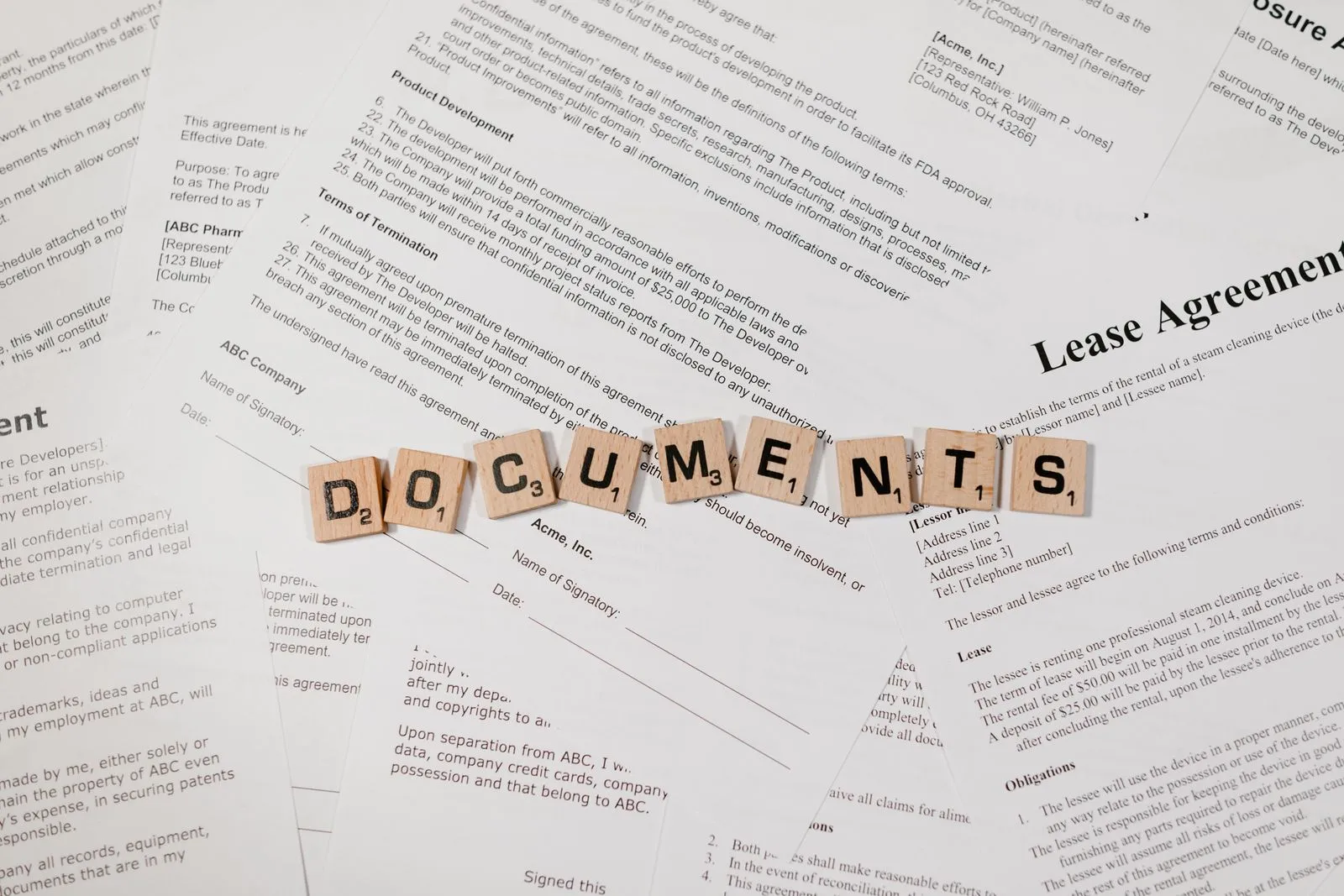 Documents and paperwork spread out on a desk